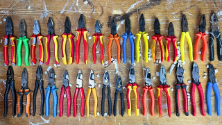 Explore the Meaning of Dolleater - TRUSTY PAIR OF PLIERS Lyrics